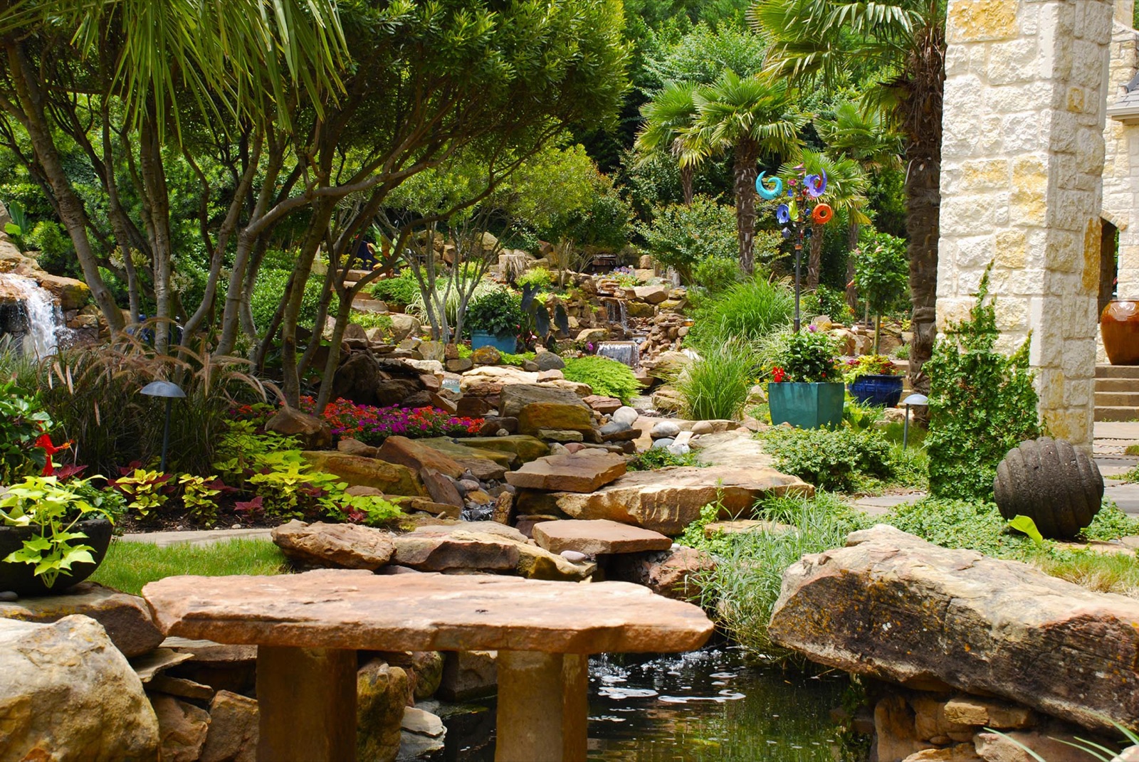 Bali Tropical Garden resort-style detail - Bali tropical landscape design by Original Landscape Concepts in Dallas