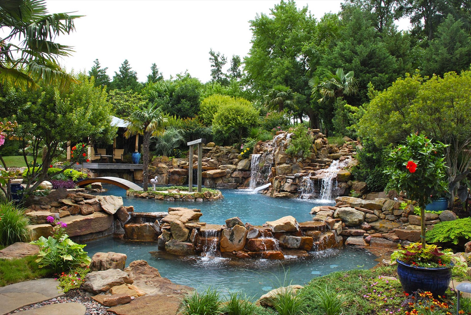 Bali tropical resort style pool garden in Dallas by landscape design firm