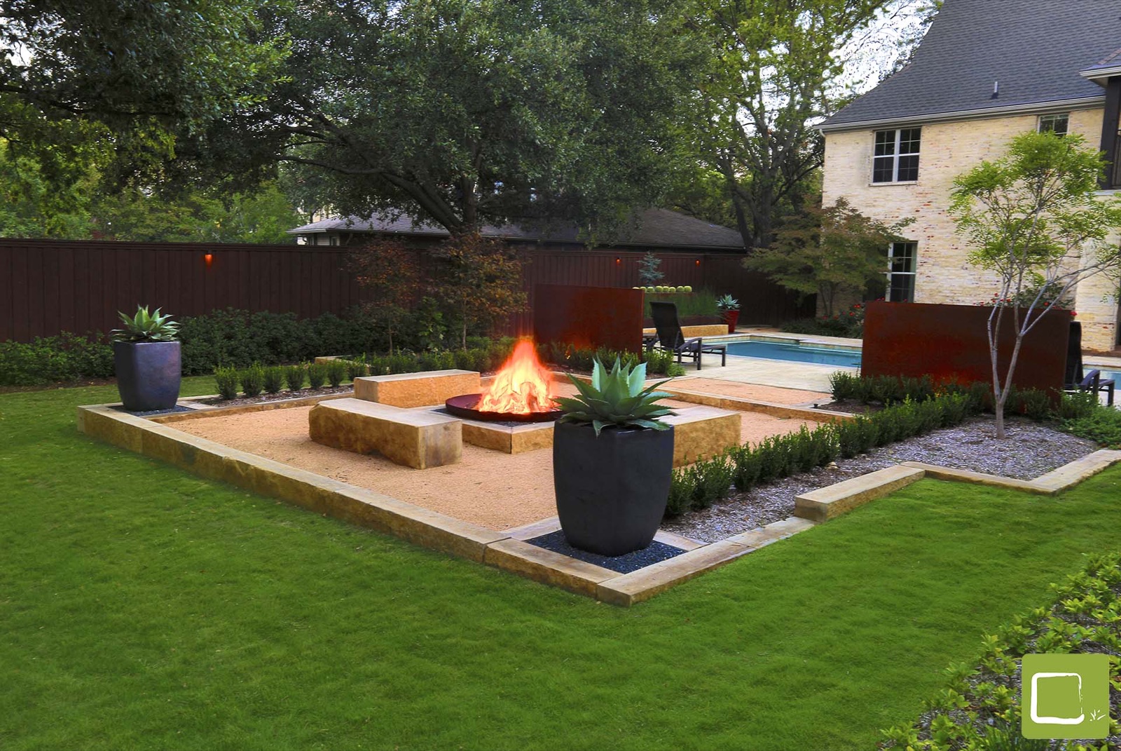 Fire bowl garden with natural quarry stone in Dallas by landscape design firm