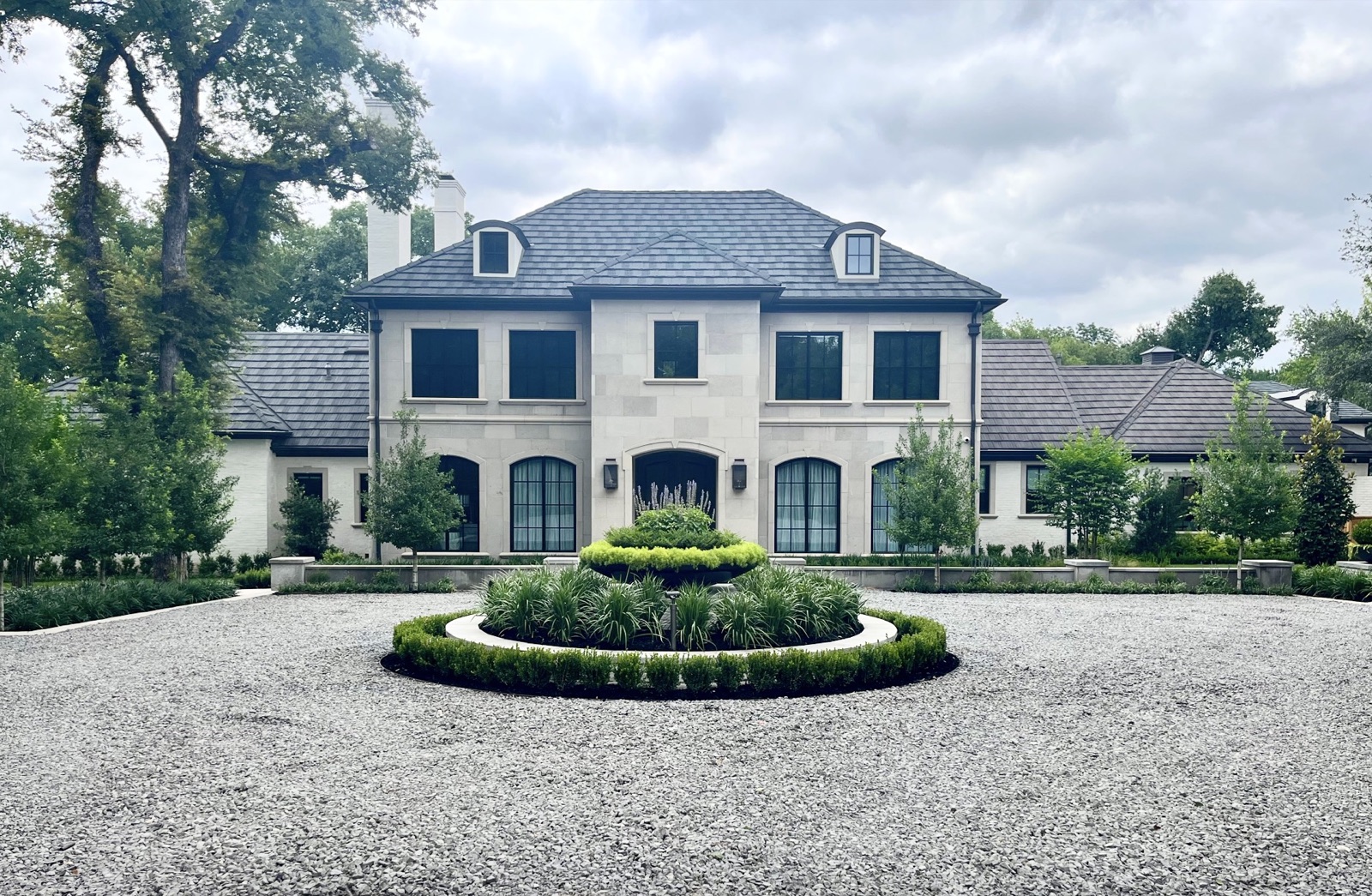 French formal pool and landscape design in Preston Hollow, Dallas by Dallas landscape design firm