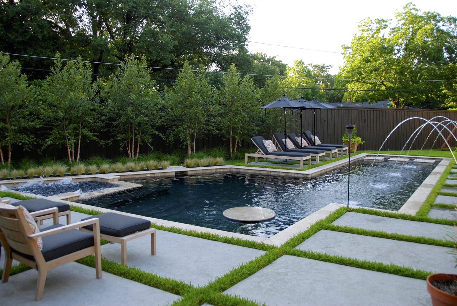 Organic modern pool landscape design in Dallas by residential landscape design firm