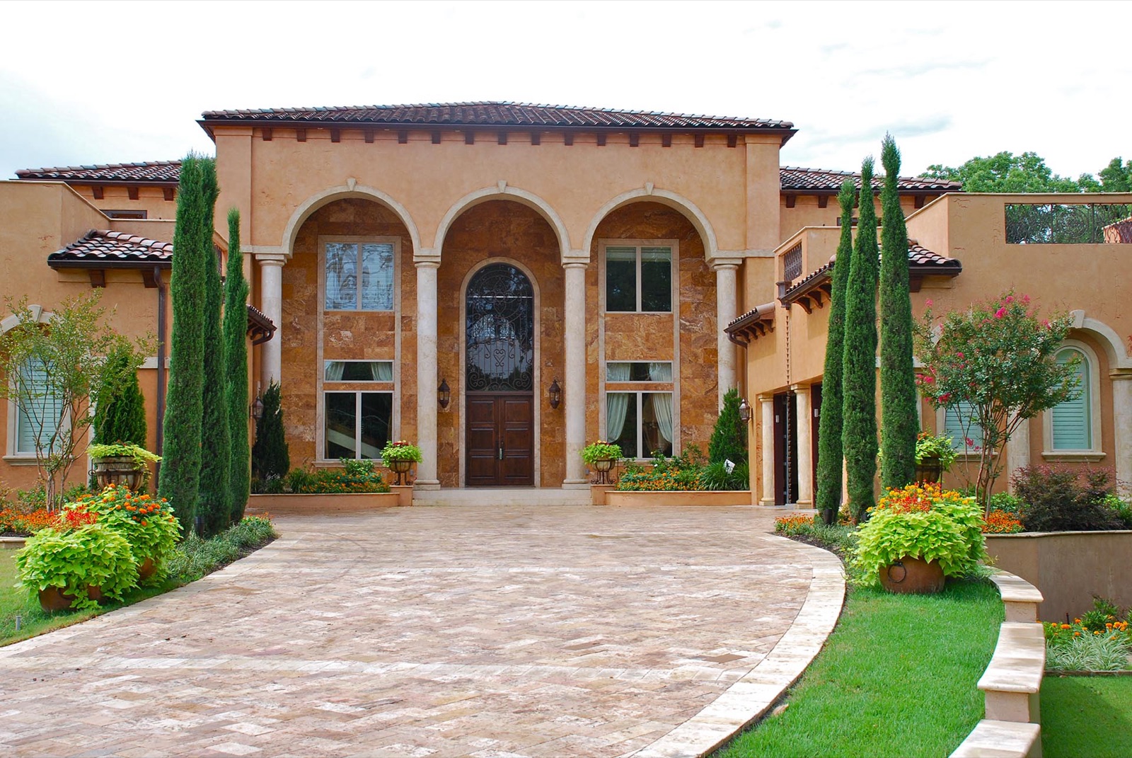 Tuscan Italian estate garden front landscape in Dallas by landscape design firm