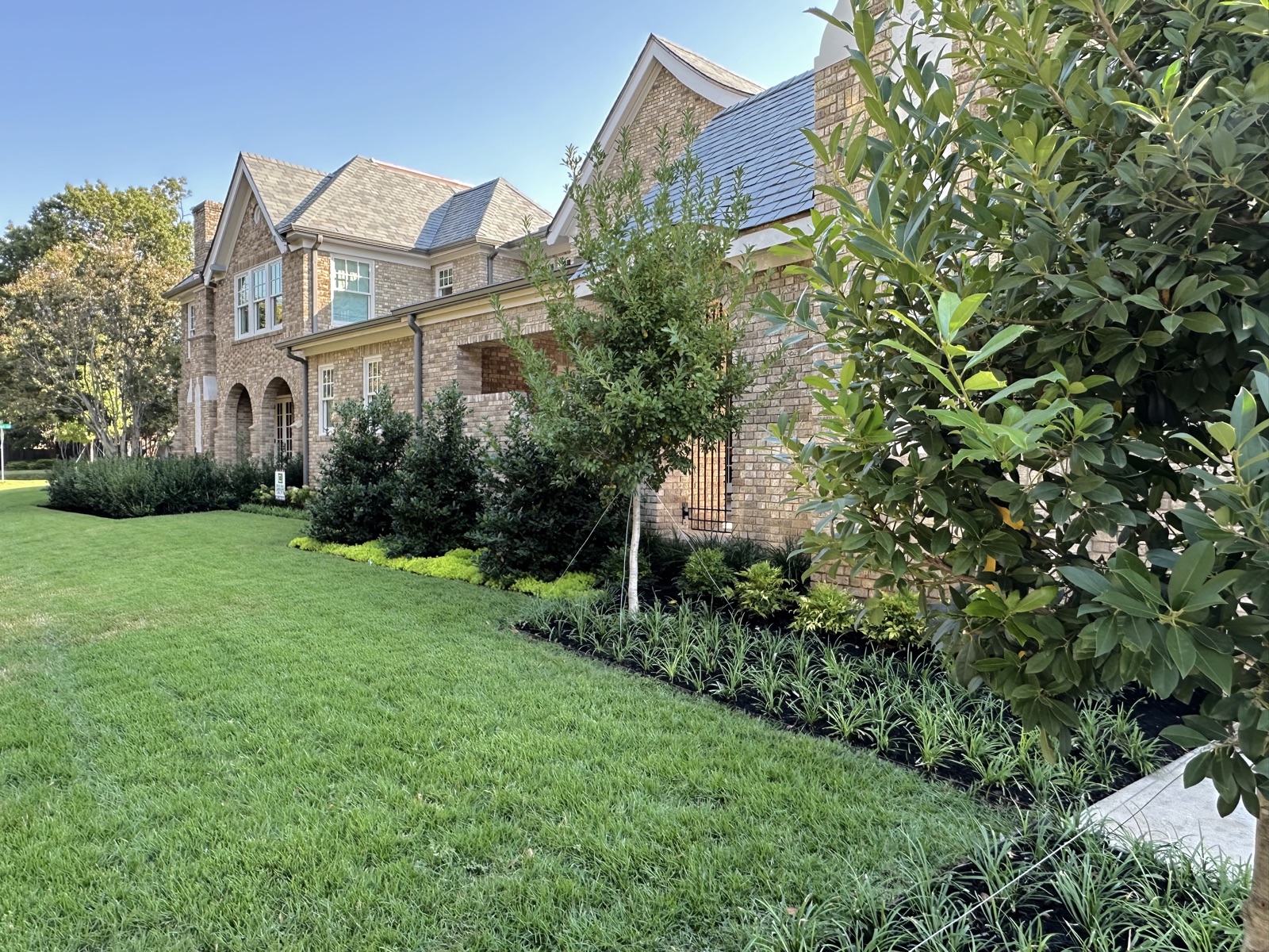 Historical Tudor landscape view 9 - residential landscape design in Dallas TX