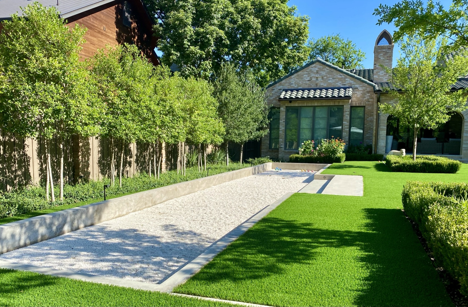 Lakewood back yard with bocce court pool in Dallas
