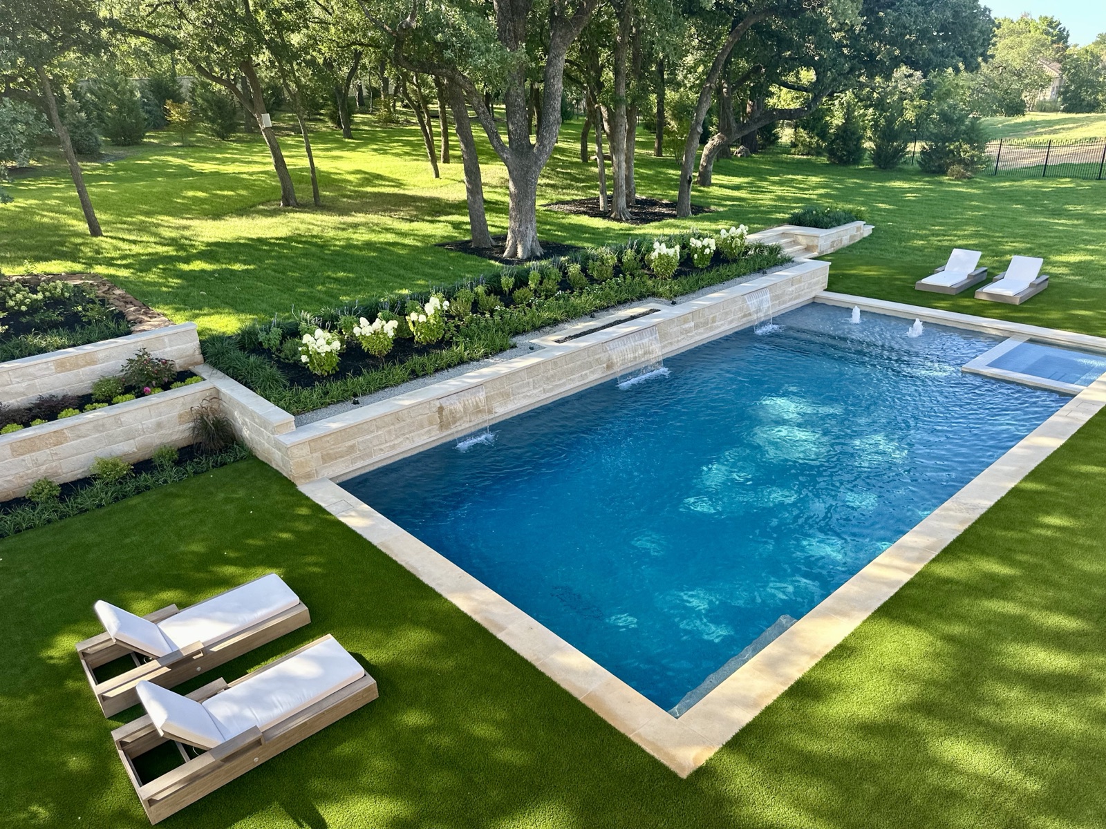 Modern Estate Pool estate landscape detail - modern estate landscape design by Original Landscape Concepts in Westlake, Texas